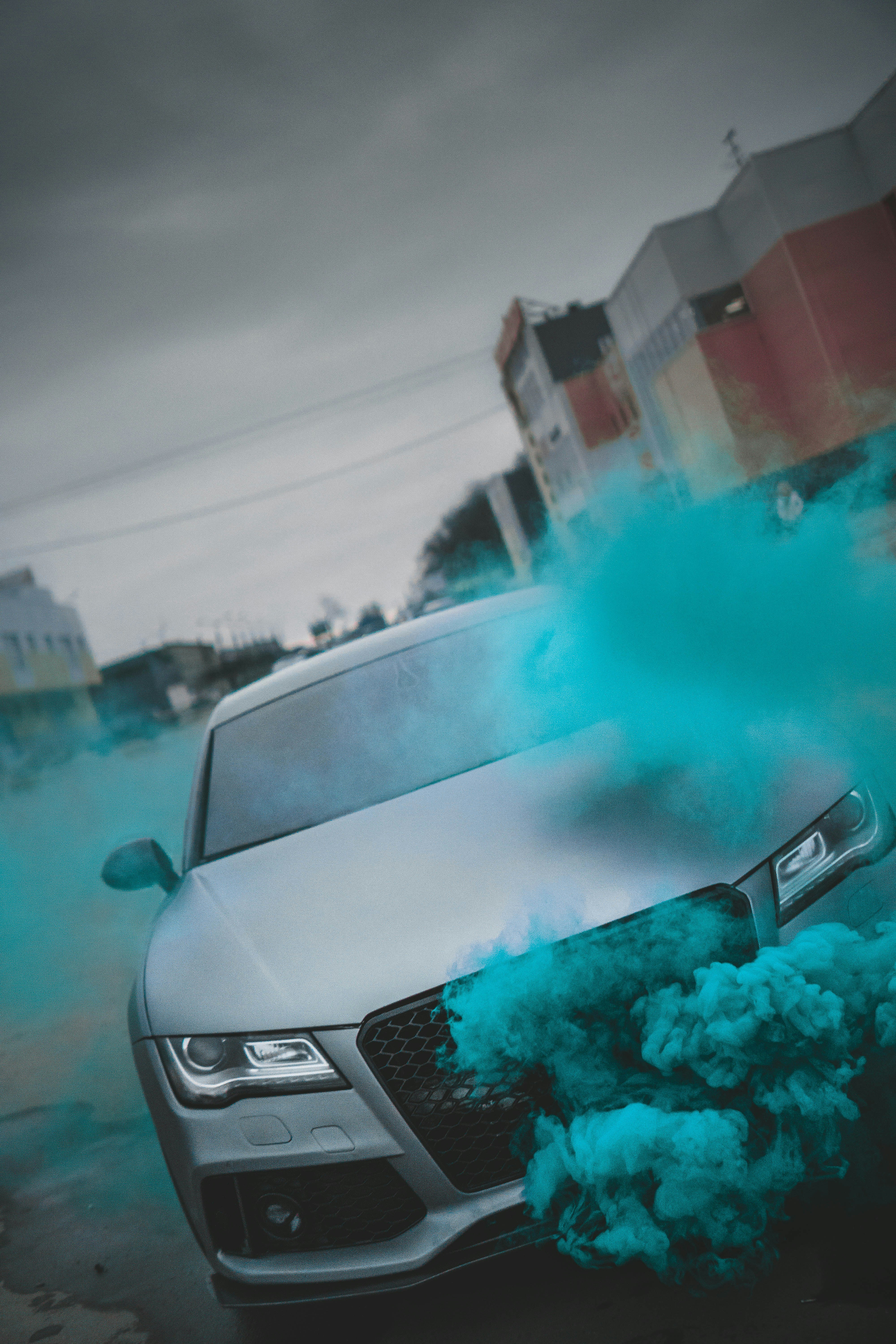 silver mercedes benz car with blue powder on hood